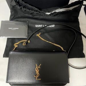 Saint Laurent CASSANDRE PHONE HOLDER IN SMOOTH LEATHER